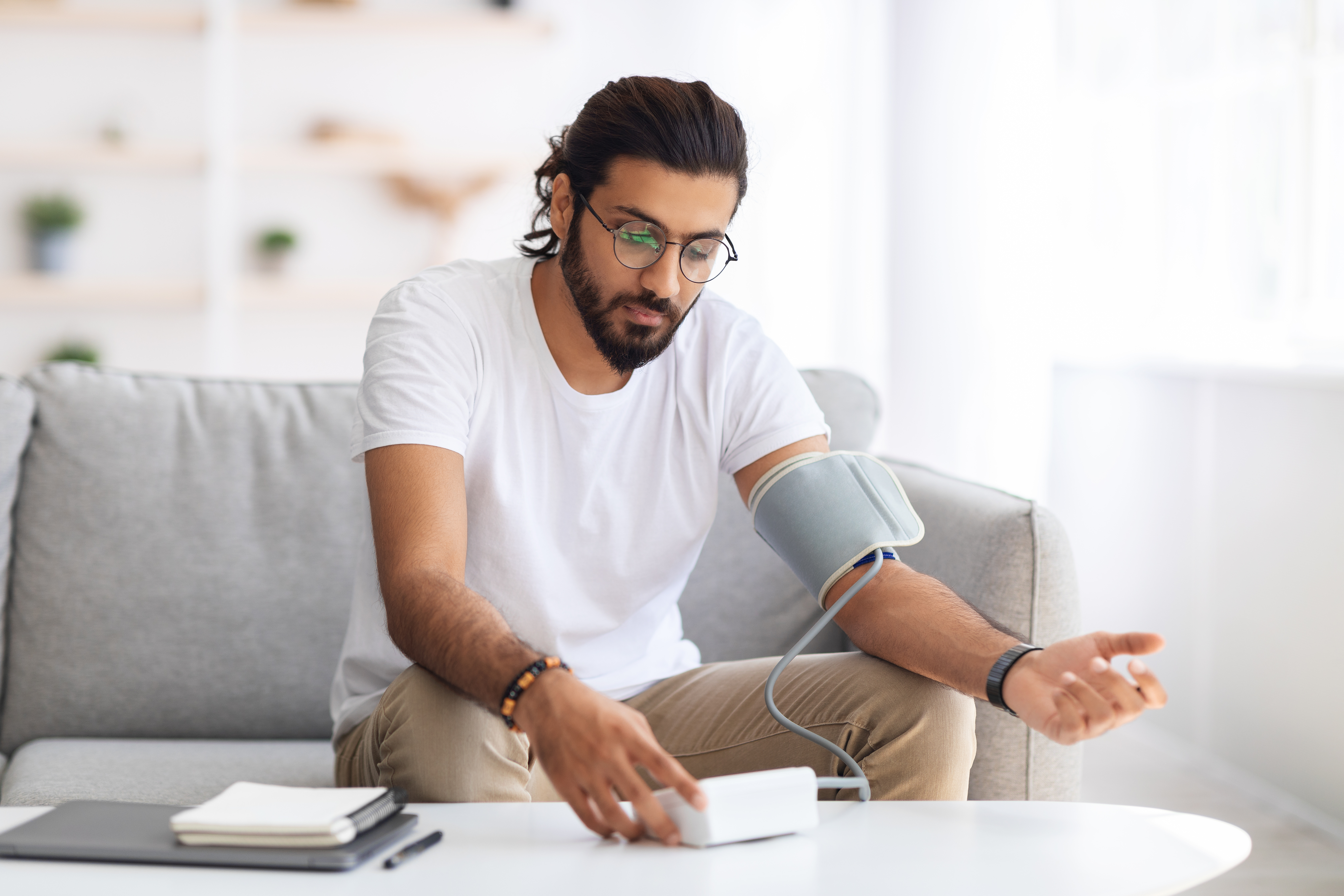 Patient monitoring blood pressure at home